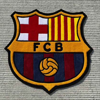 Plush FC Barcelona logo rug with shield crest and striped flag, yellow edging